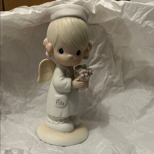 Precious Moments White and Pink Nurse Angel Figurine Holding Flowers
